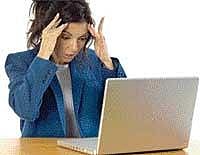 In many offices, personal attention to each PC from a technician seemed the only way to fix the problem. GETTY IMAGES