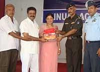 MLA M P Appachu Ranjan releasing the magazine Kodagian at the annual day celebration of Kudige Sainik School in Kushalnagar on Saturday. DH Photo