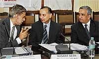 Discussion: Chief Secretary S V Ranganath has a word with Syndicate Bank Chairman and Managing Director Basant Seth and Reserve Bank of India Regional Director P Vijaya Bhaskar at the State Level Bankers Committee meeting in Bangalore on Friday. DH Photo