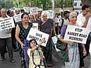 Residents under the banner of Save Sankey Road and Park Forum taking out a protest rally against road widening near Sankey Tank on Sunday. DH PHOTO