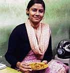 Savouring A customer enjoying a plate of chaat.