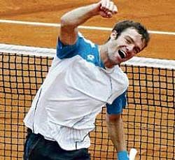 Russian Teimuraz Gabashvili celebrates after putting out mens sixth seed Andy Roddick of the United States in the third round of the French Open on Saturday. AP