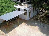 Encroachment:  The temple which has come up illegally on a  site marked  for park at Arehally. Dh Photo