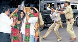 Telugu actor Chiranjeevi (right) places a silver crown on actor Shivarajkumar, as Ambareesh looks on, at the muhurtham of Kannada film Jogayya in Bangalore on Monday. Police thrash a fan outside the stadium. DH Photos