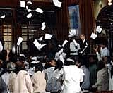 Opposition party MLAs stage a dharna during assembly session at Vidhana Soudha in Bangalore on Thursday. -KPN