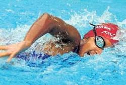 Malavika V en route to the Group III 100M freestyle gold on Thursday. DH photo/ Srikanta sharma R