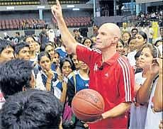 NBA Director, Basketball Operations in India, Troy Justice interacts with kids in Bangalore on Saturday. DH photo
