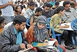 for right choice: Students and parents attending the engineering courses selection round at the CET Counselling Centre in Bangalore on Thursday. DH Photo