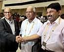 Karnataka Chief Minister B S Yeddyurappa shares a light moment with Textiles Minister Dayanidhi Maran and Goa Chief Minister Digambar Kamat at the 55th meeting of National Development Council at Vigyan Bhavan in New Delhi on Saturday. PTI