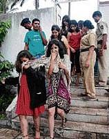 Students of Symbiosis Institute are detained by the police for organising a 'friendship day' party without proper permission at a farmhouse in Pune on Sunday. PTI