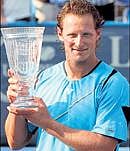 David Nalbandian holds aloft the Washington Classic Trophy on Sunday. AFP