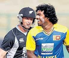 hitman: Sri Lankan pacer Lasith Malinga (right) celebrates after dismissing New Zealands Gareth Hopkins on Friday. Reuters