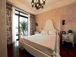 Theme-Based: You can give your room a Tudor look with wooden furniture, lace curtains and heavy quilts. Getty Images