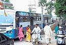 Chaotic: Buses stop on the Lingarajapuram flyover causing traffic jams.