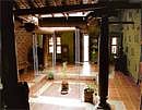 RECREATING MAGIC  Carved pillars are used as beams and the inner courtyard opens to the sky.  Photos by the Poornima Dasharathi