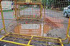 Rainwater collected in a pothole near Lakshmipuram School on JLB Road.