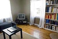 Pick a sturdy leather couch and low coffee-table in minimalist style.