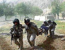 A US soldier is evacuated to a helicopter after a roadside bomb attack in Kandahar on Monday. REUTERS