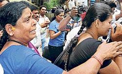 Shivkumars mother and wife Suma.