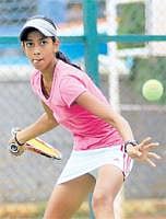 Eye on the ball: Karman Kaur en route to her win over Shweta Samuel in the AITA Championship Series. DH Photo