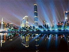 Spectacular: Lights streak across the sky projected during the final rehearsal for the opening ceremony of the 16th Asian Games in Guangzhou, China. AFP