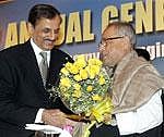 Finance Minister Pranab Mukherjee (right) welcomed by Bharat Chamber of Commerce President Pavan Poddar at its 110th Annual General Meeting in Kolkata on Saturday. PTI