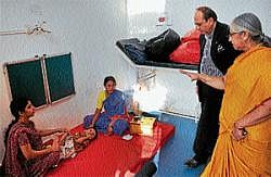 AIISH Director Dr Vijayalakshmi Basavaraj explaining about the facilities to Union Minister of State for Health and Family Welfare Dinesh Trivedi in Mysore on Wednesday. DH photo