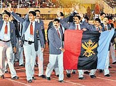 Overall champions Services team waves to the crowd during  the closing ceremony of the National Games. PTI