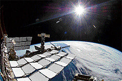 Nasa makes history with spacewalk, station finale