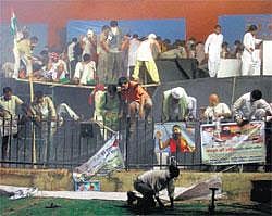MIDNIGHT MELEE A chaotic scene at the Ramlila Ground during the police action against Baba Ramdev and his supporters in NewDelhi on Saturday night. PTI