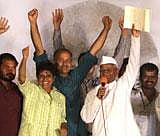 Anna Hazare with his team celebrate the news that his three conditions have been unanimously accepted by Parliament, at Ramlila Maidan in Delhi on Saturday. PTI