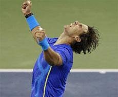 On A Roll: World number one Novak Djokovic cannot hide his delight after coming from two sets down to knock out Roger Federer in the US Open semifinals on Saturday. Djokovic will face Rafael Nadal in the final on Monday. Reuters