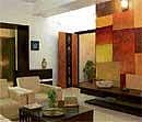 SIMPLE & APPEALING: The living room with the stylishly designed door.