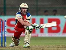 Royal Challengers Bangalore AB De Villiers plays a shot during the match against Warriors in Champions league T20-2011 at Chinnaswamy in Bangalore on Friday. PTI