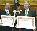 American Bruce Beutler(L) and Luxembourg-born scientist Jules Hoffmann(R) have shared the 2011 Nobel Prize in medicine with Canadian-born Ralph Steinman. FIle Photo/AFP