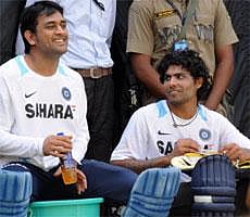 Indian cricket captain Mahendra Singh Dhoni with teammate Ravindra Jadeja during a training session at Ferozeshah Kotla Ground in New Delhi on October 16, 2011. AFP File Photo