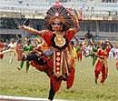 Students perform during Kannada Rajyotsava celebrations at Kanteerava Stadium in Bangalore Tuesday. --KPN
