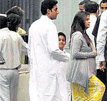 Aishwarya Rai-Bachchan along with Abhishek Bachchan arrives at a hospital in Mumbai on Sunday evening. PTI