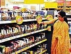 A shopper looks for products at a More Hypermarket outlet in Bangalore. DH Photo by S K Dinesh