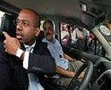 New Delhi: Indigo President, Aditya Ghosh (L) and CEO, Rahul Bhatia come out after a meeting with Prime Minister Manmohan Singh at 7RCR in New Delhi on Saturday. PTI Photo