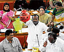 Water woes: Congress members display empty pots in the BBMP Council to highlight the drinking water crisis in the City, on Thursday. DH Photo