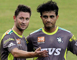 Pune Warriors skipper Sourav Ganguly with teammate Michael Clarke during a training session at the Barabati Stadium in Cuttack on Monday, a day before their IPL-5 match against Deccan Chargers. PTI