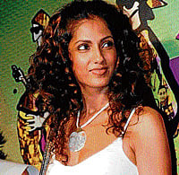 perfect pose Sheetal Mallar looks awesome with her locks.