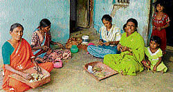 A family in D Palya village of Gauribidanur taluk engaged in beedi rolling. dh photo