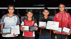 Champions Winners of the State-ranking badminton meet. From left: Shikha Gautam (girls U-15 singles and doubles), Mithula UK (girls U-13 singles and doubles), Amogh R Gupta (boys U-13 singles) and Mithun Manjunath (boys U-15 singles and doubles). DH PHOTO