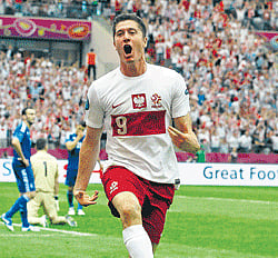 OVER THE MOON: Poland's Robert Lewandowski celebrates after scoring against Greece  during their Euro 2012 match in Warsaw on Friday. REUTERS