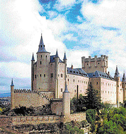 Spanish history  Alcazar Castle; (below) the Roman aqueduct in Segovia. photo by author