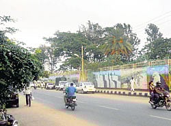The construction of a median is expected to bring in lane discipline among motorists using the Malleshpalya main road. Dh Photo