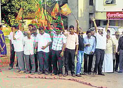 The BJP workers celebrate the victory of the partys candidates after Legislative Council election results were out in Udupi on Wednesday. dh photo