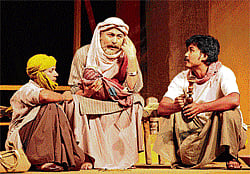 testing times Disguised fakir Darya Shah (C) with Peera (R) in the play Begum ka takia.